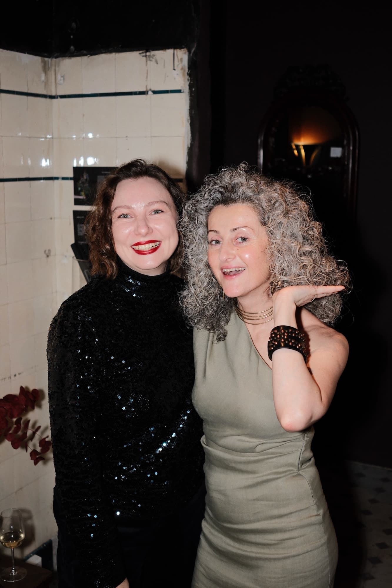 Two guests laughing together at the club’s gala evening